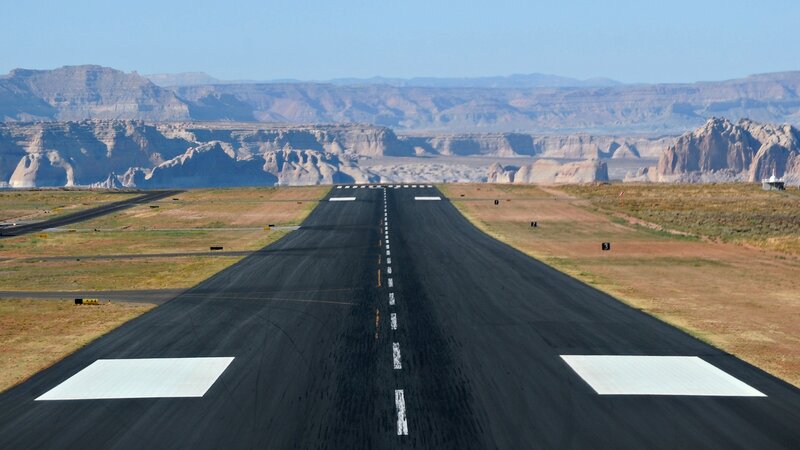Runway in desert canyon landscape