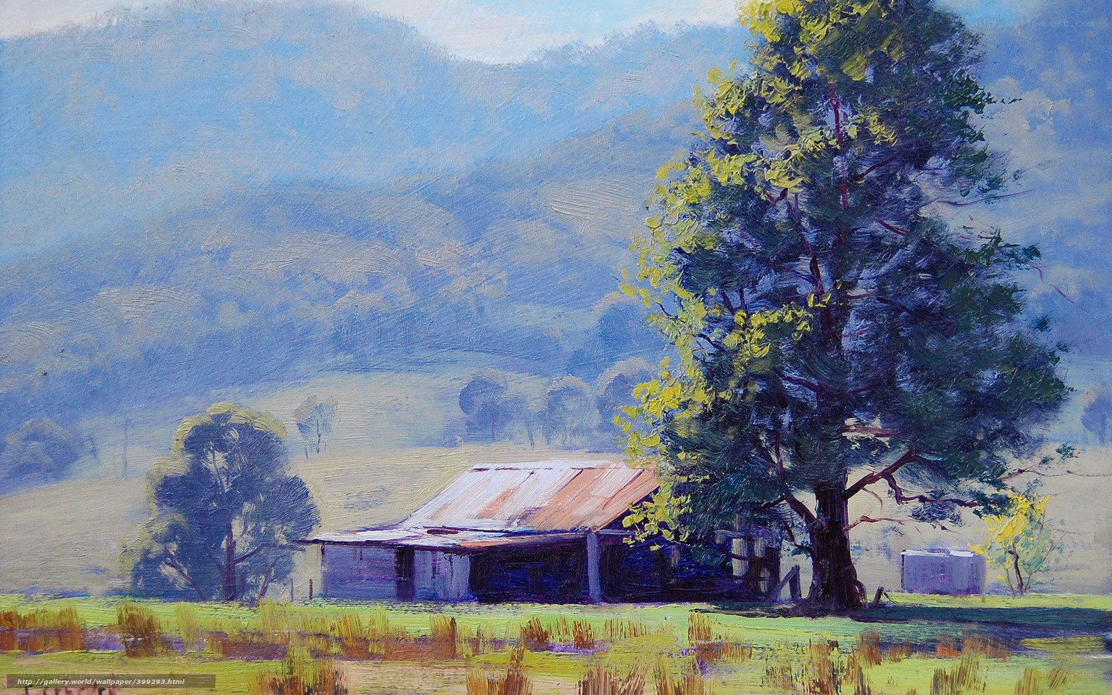 Rural barn under a large tree