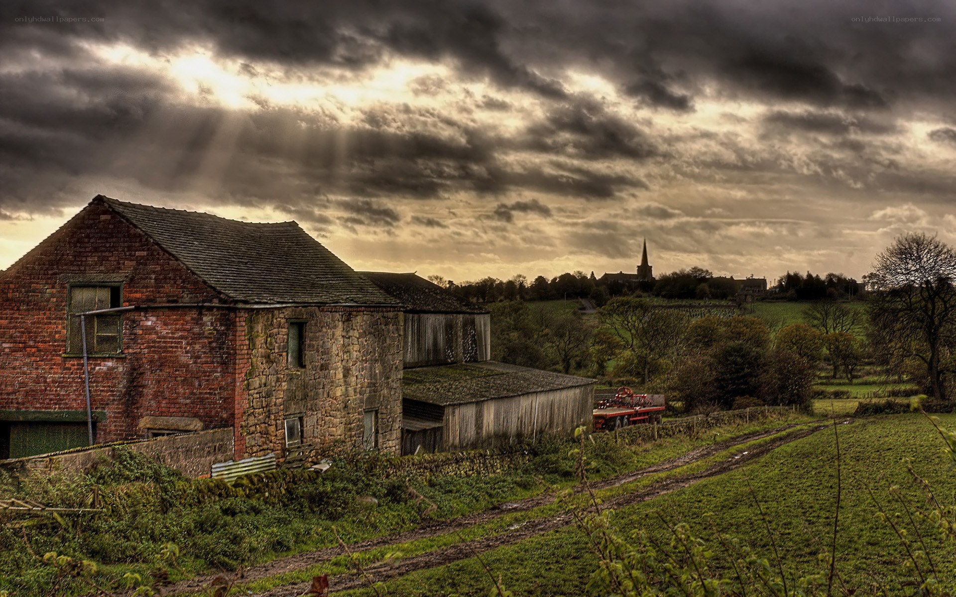 Rural barn under stormy sky