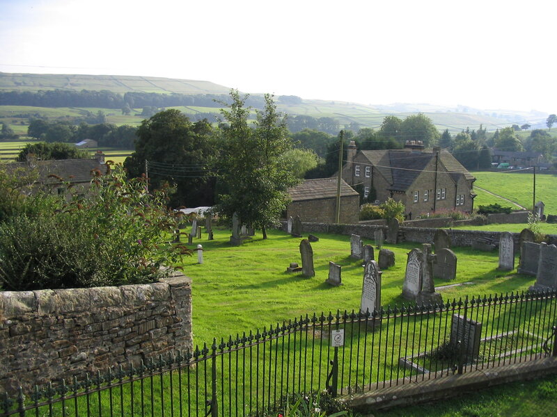 rural churchyard with stone graves