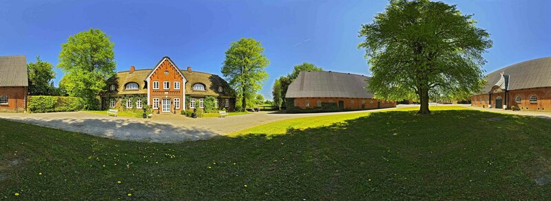 rural farm complex with brick buildings