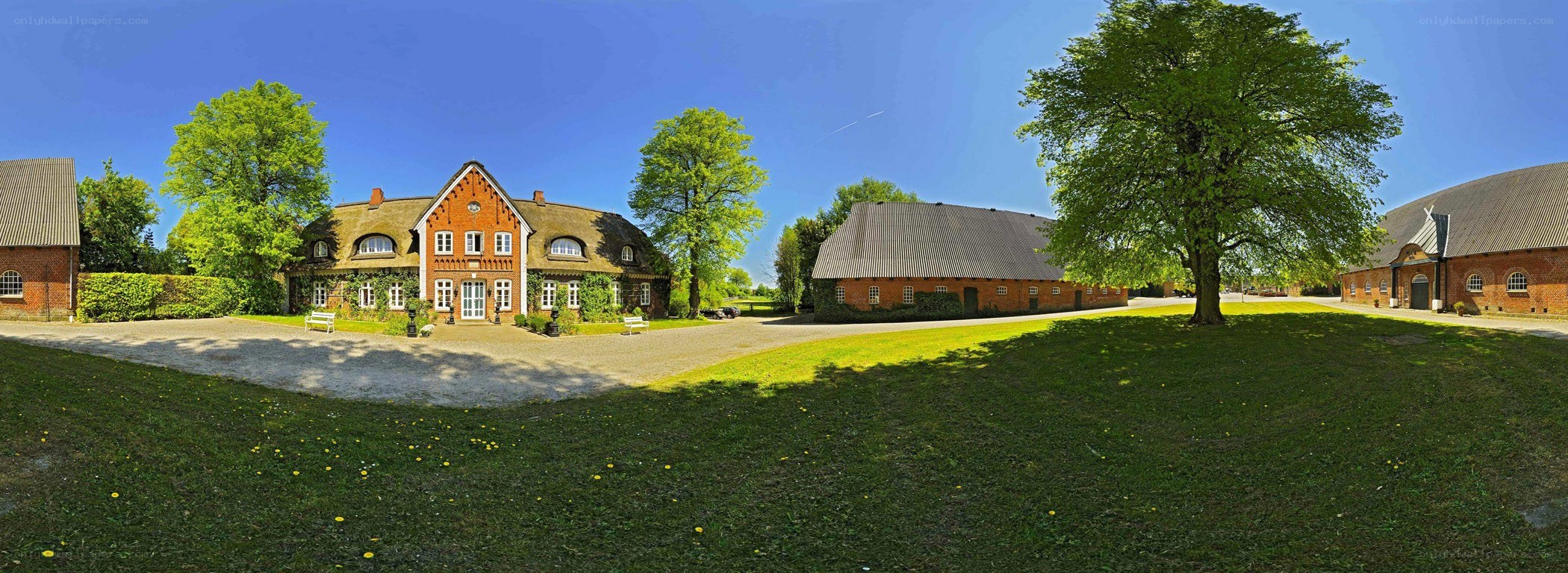 rural farm complex with brick buildings