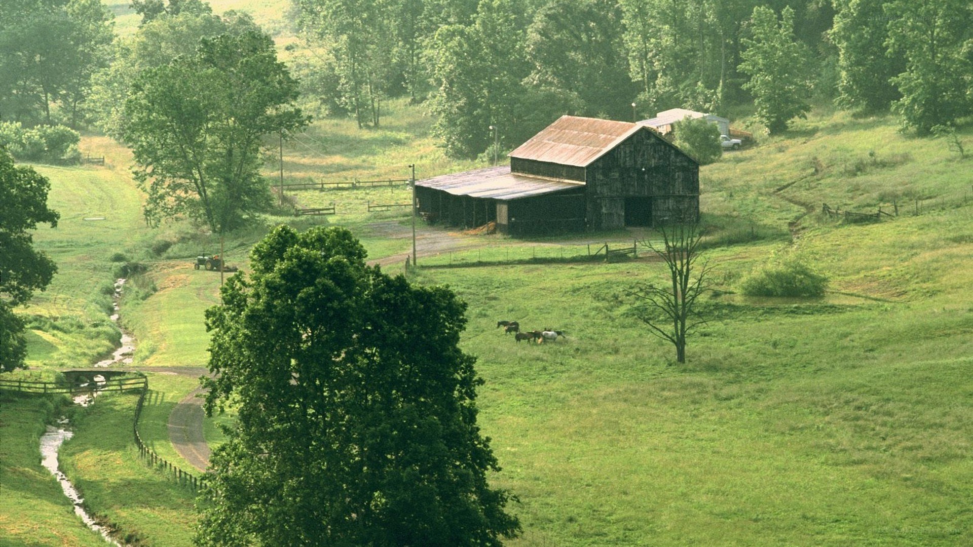 Rural farm with barn and stream