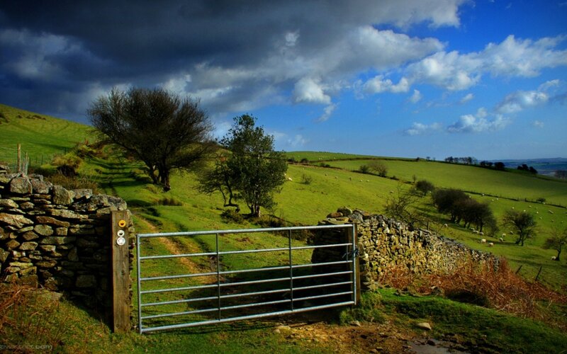 Rural gate with rolling hills