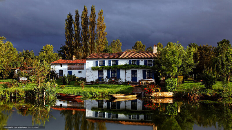 Rural house by a pond