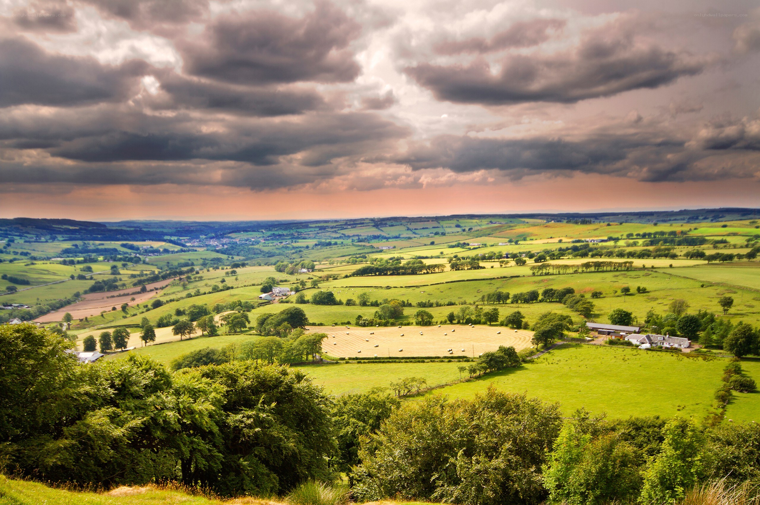 rural landscape under stormy sky