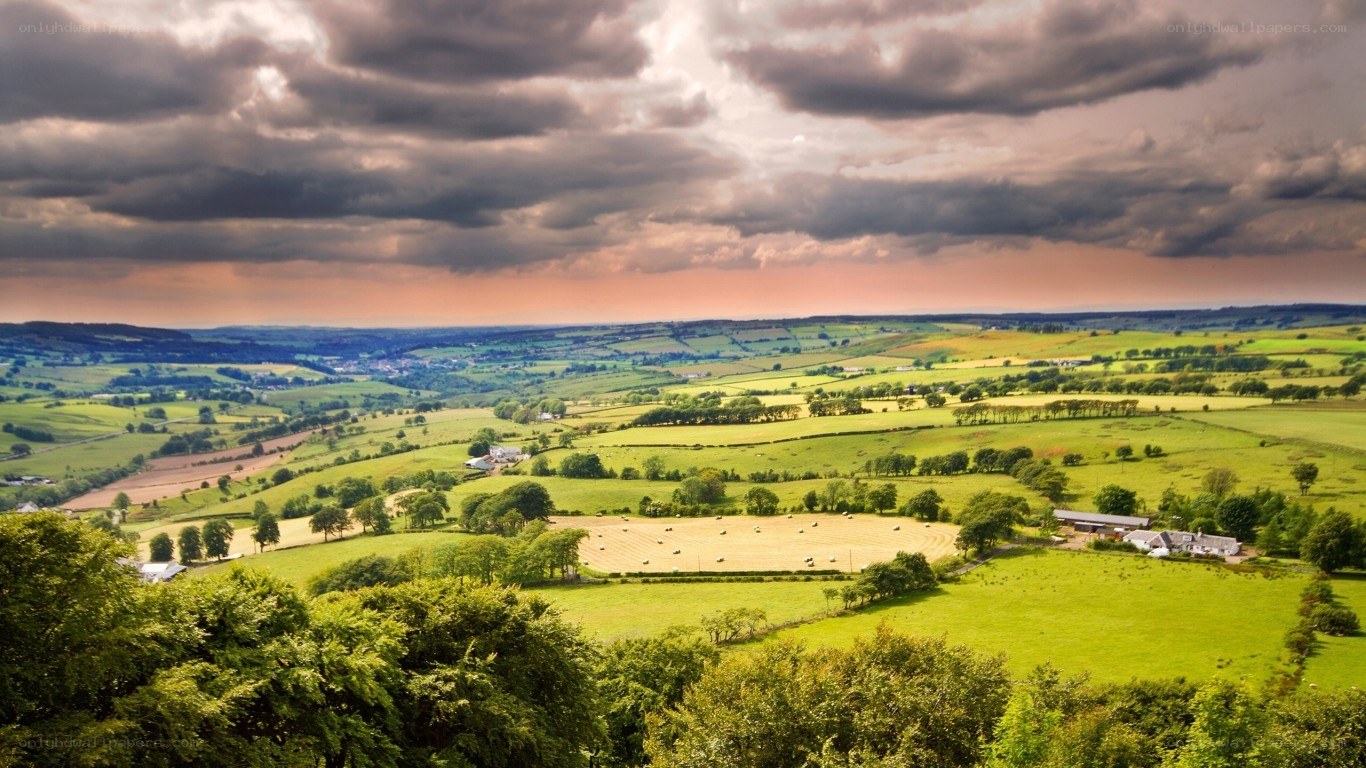 rural landscape under stormy sky