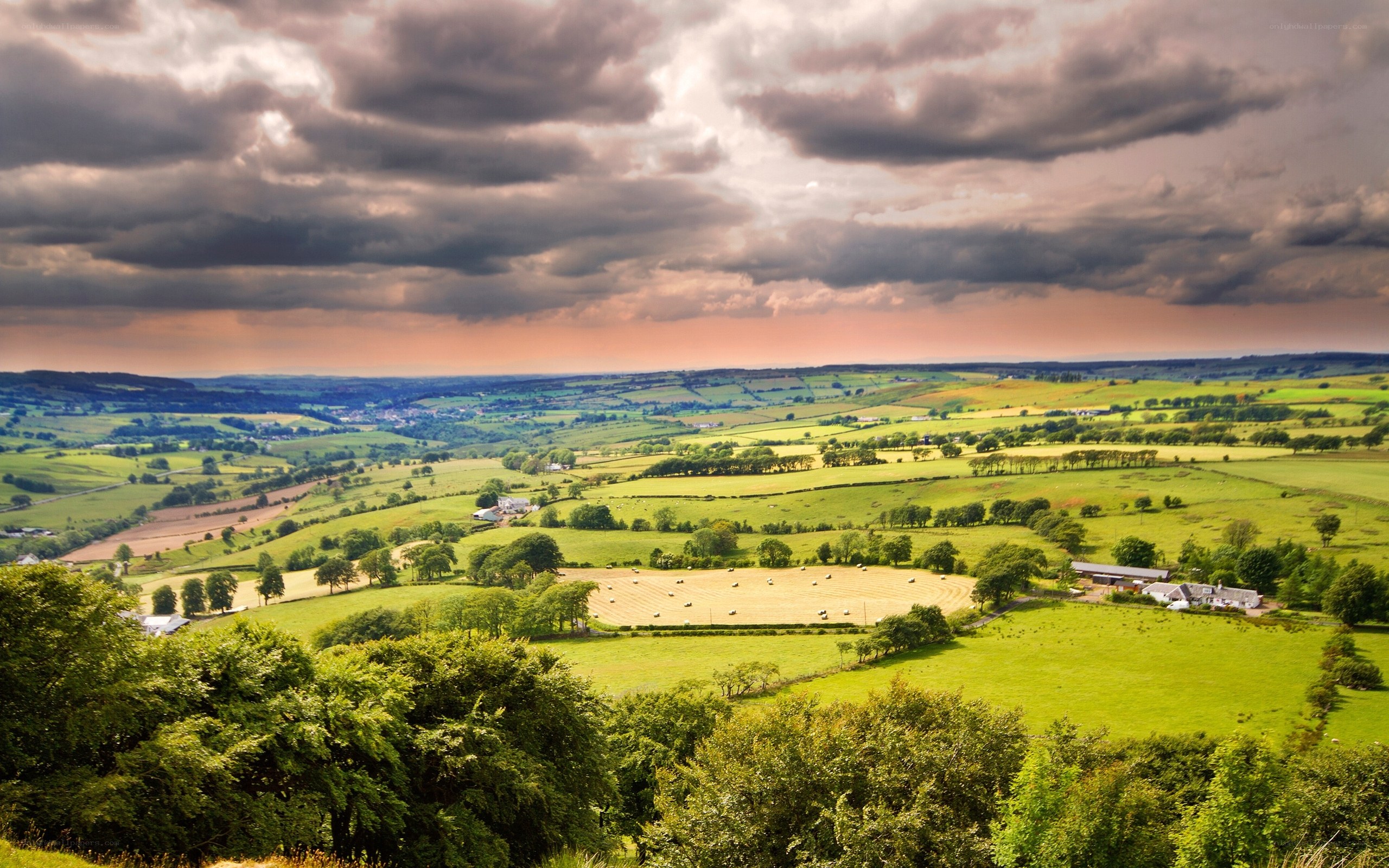 rural landscape under stormy sky