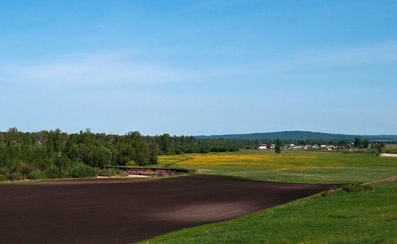Rural landscape with fields and village