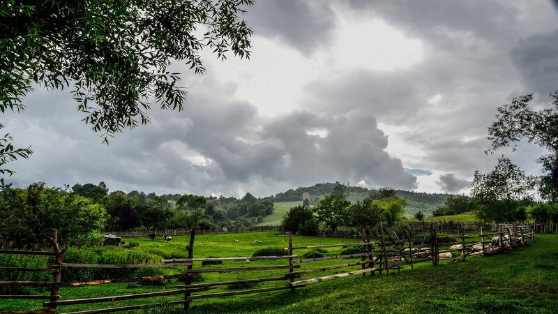 Rural landscape with stormy sky