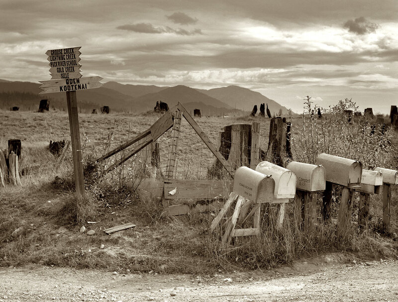 Rural mailbox and signpost