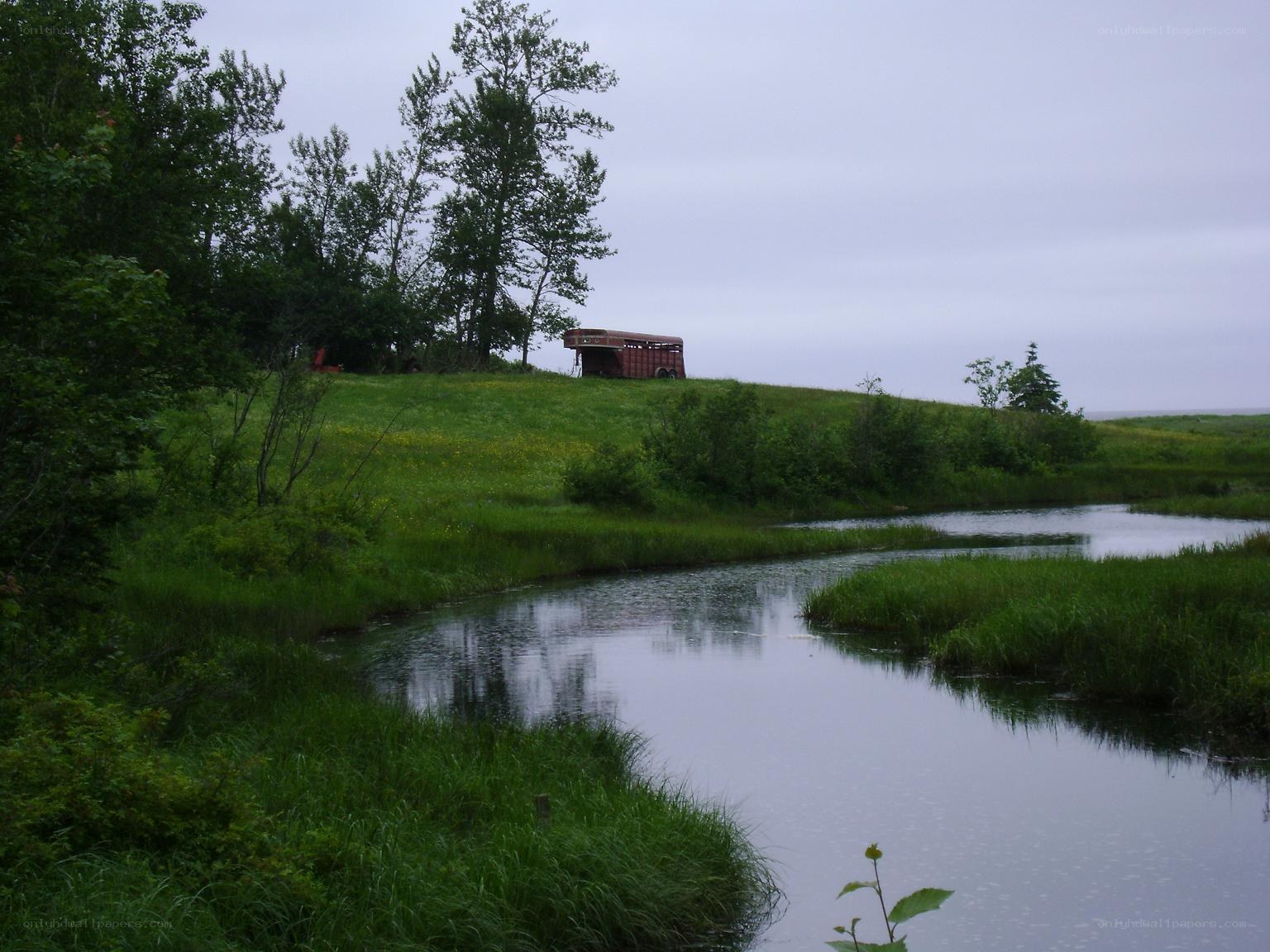 Rural river with horse trailer