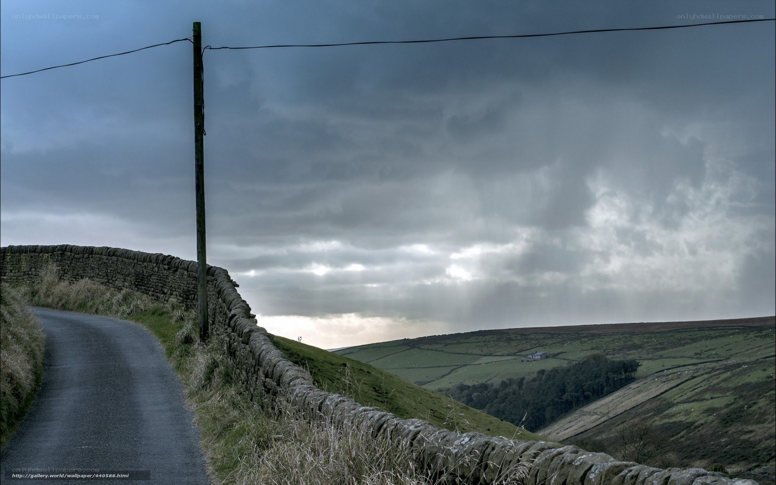 Rural Road Under Stormy Sky