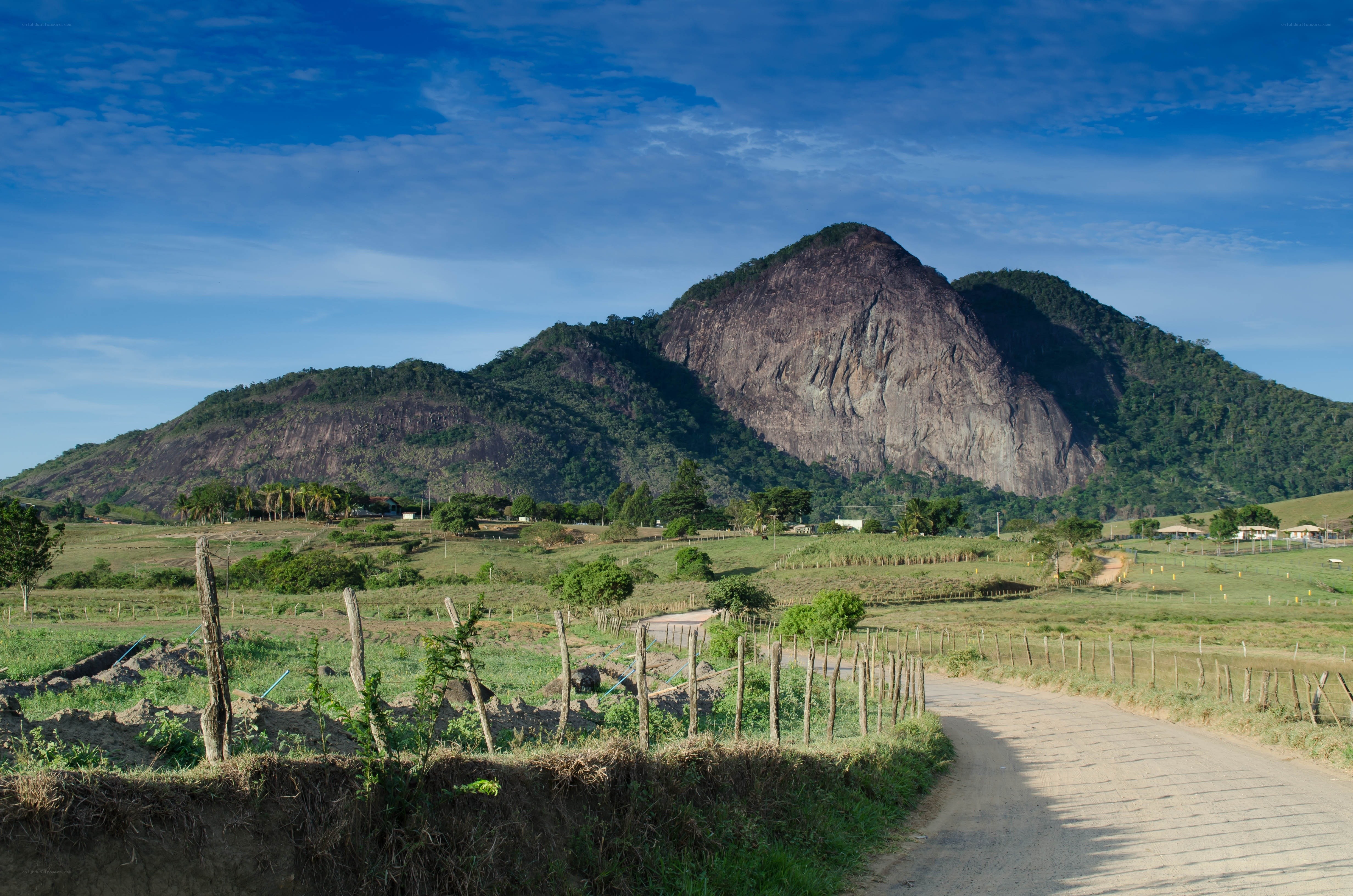 Rural road with mountain backdrop