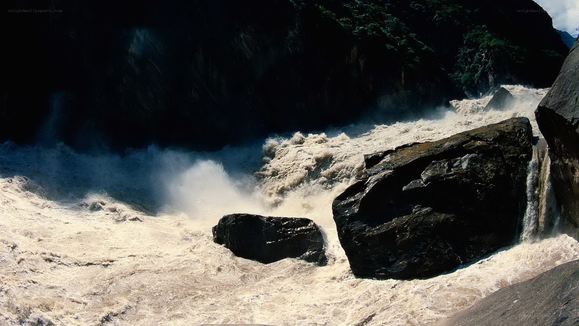 rushing river through rocky canyon