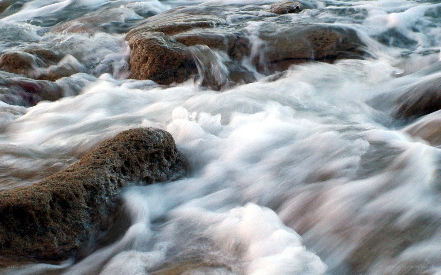 Rushing water over rocks