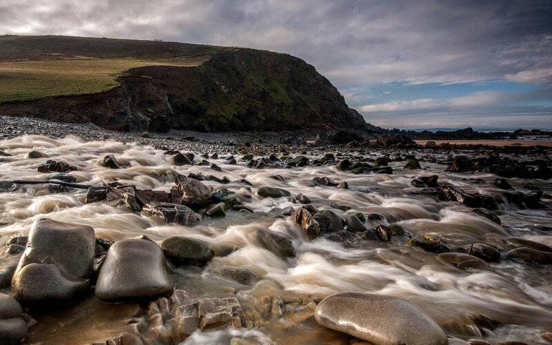 Rushing water over rocks at the coast