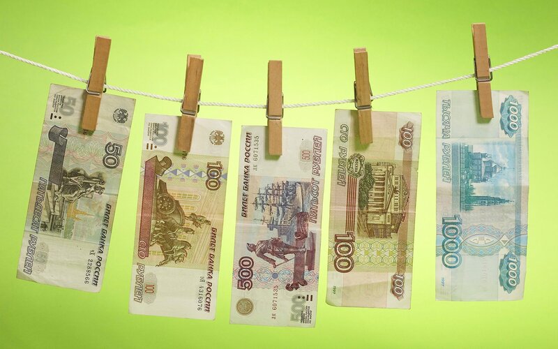 Russian banknotes on clothesline