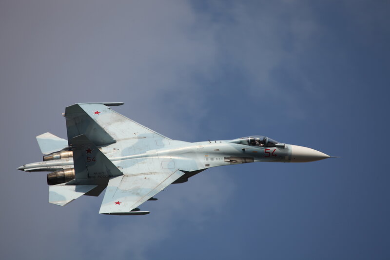 Russian Fighter Jet — Blue, Dynamic, Afternoon