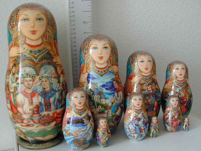 Russian nesting dolls with painted scenes