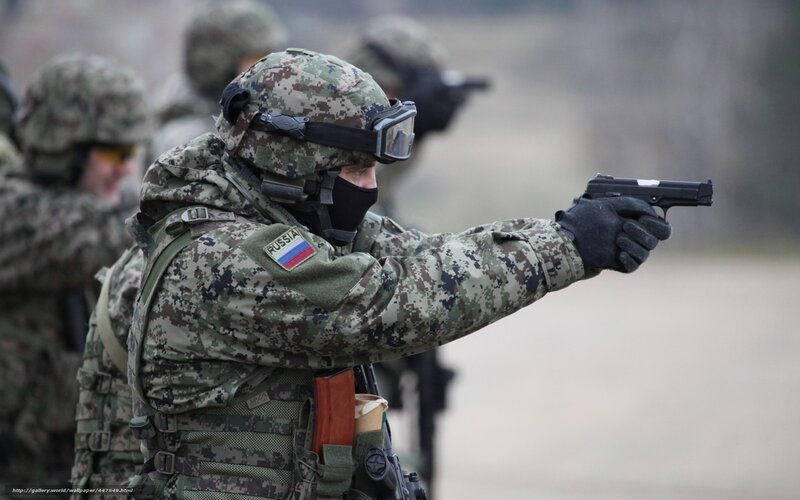 Russian soldier aiming pistol