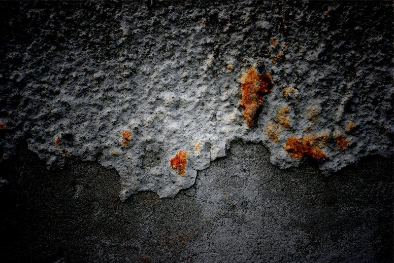 Rust on Concrete Wall