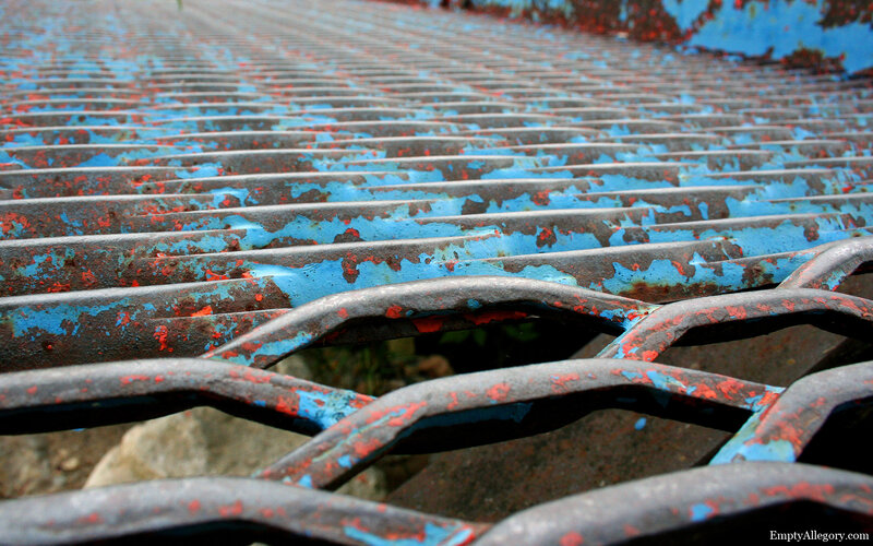 Rusted blue metal grate