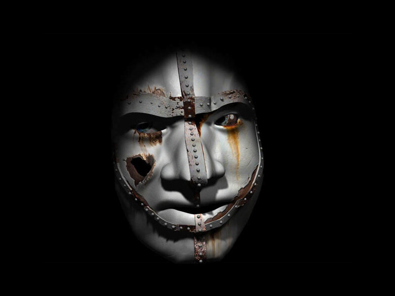 rusted metal mask with decay