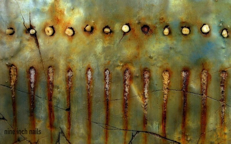 Rusted metal with embedded teeth