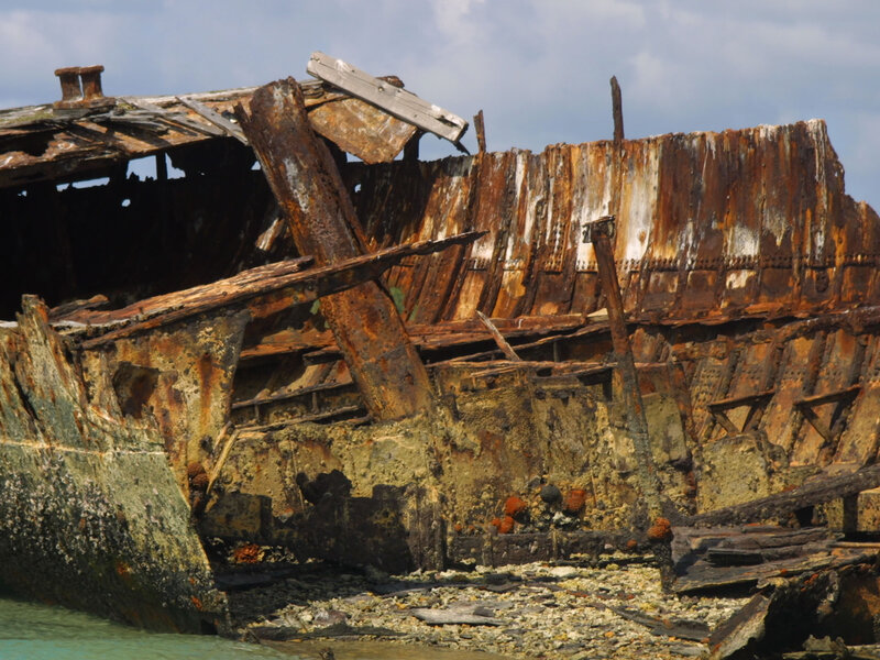 Rusted shipwreck on shore