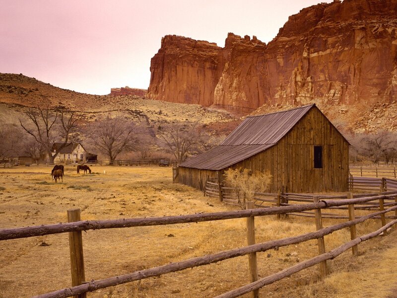 Rustic barn in desert canyon