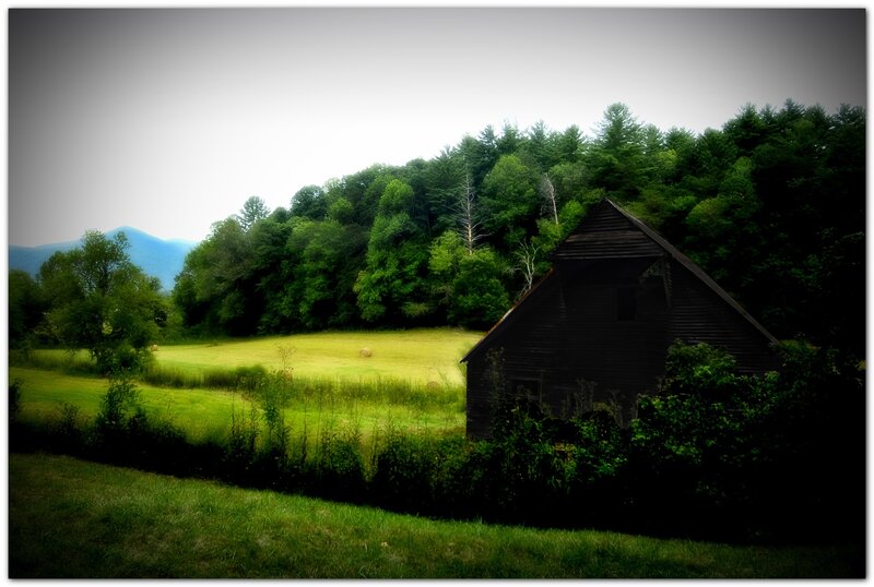 Rustic barn in green valley