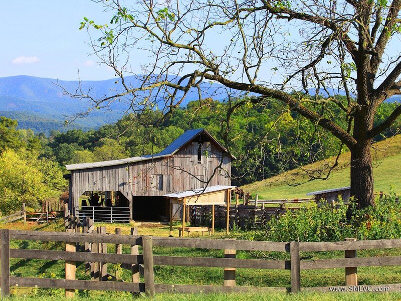 Rustic barn in mountain valley