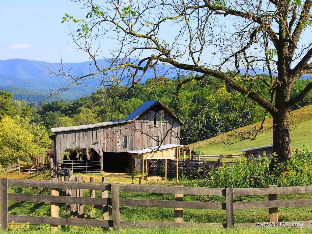 Rustic barn in mountain valley
