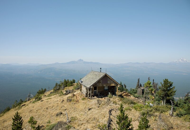 Rustic cabin on mountain peak