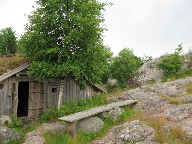Rustic cabin on rocky hillside