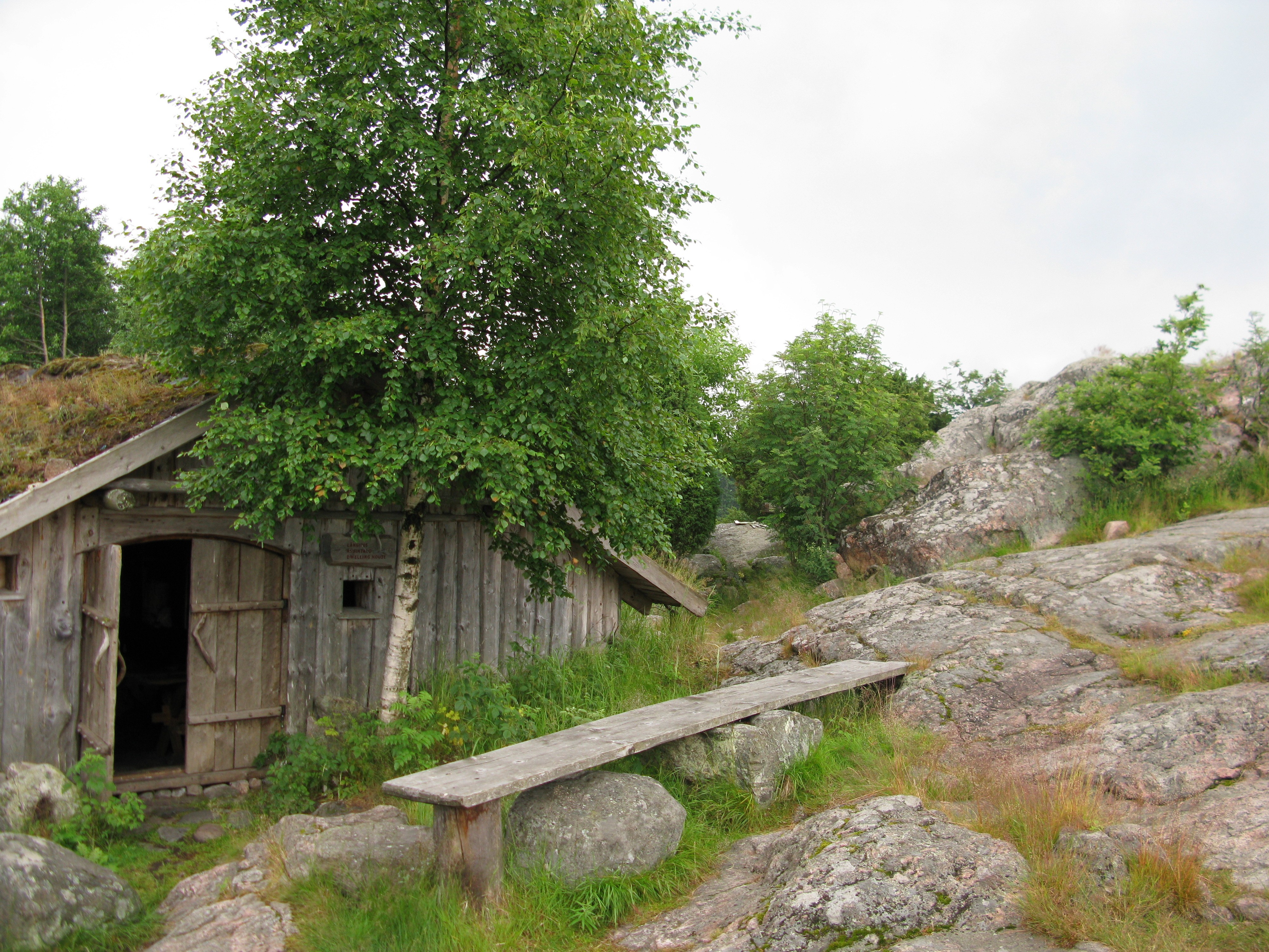 Rustic cabin on rocky hillside