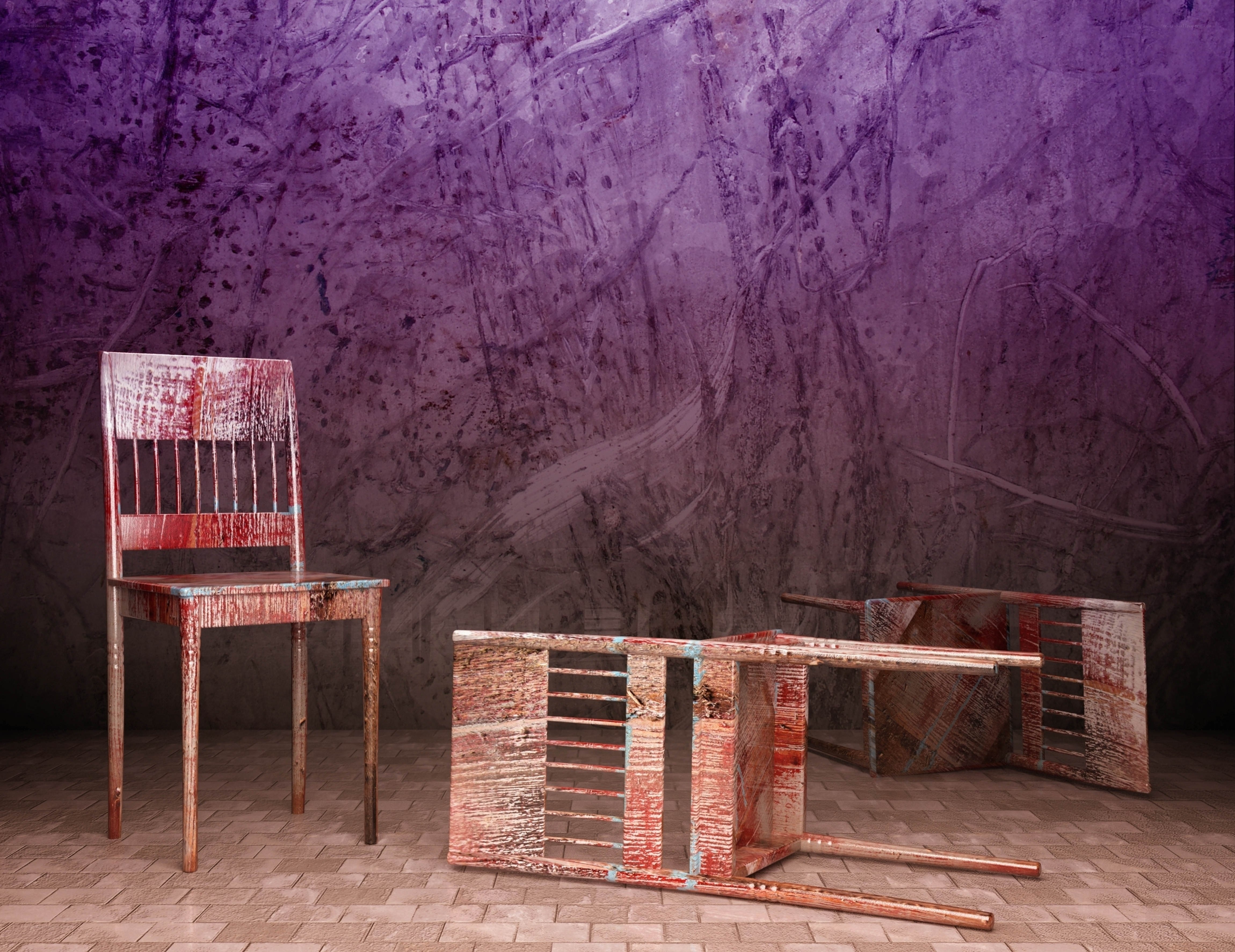 Rustic chairs against purple wall