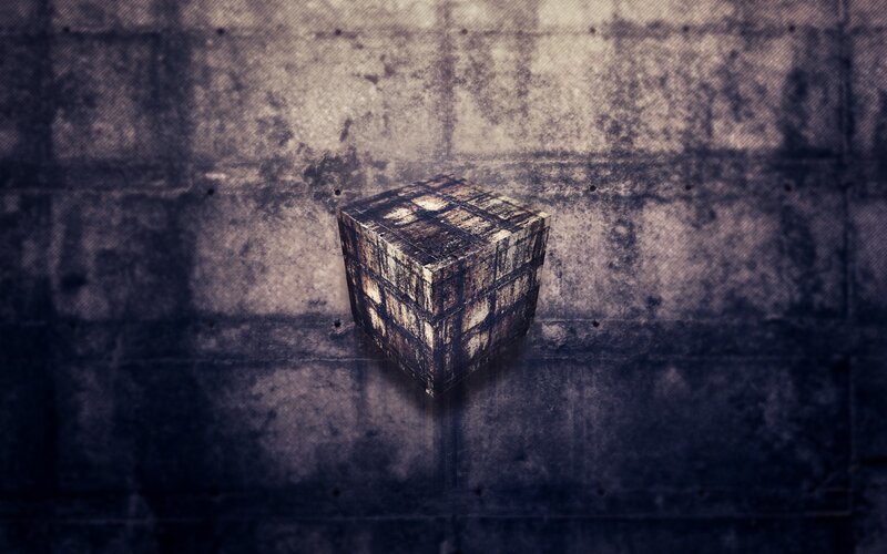 rustic cube on concrete wall