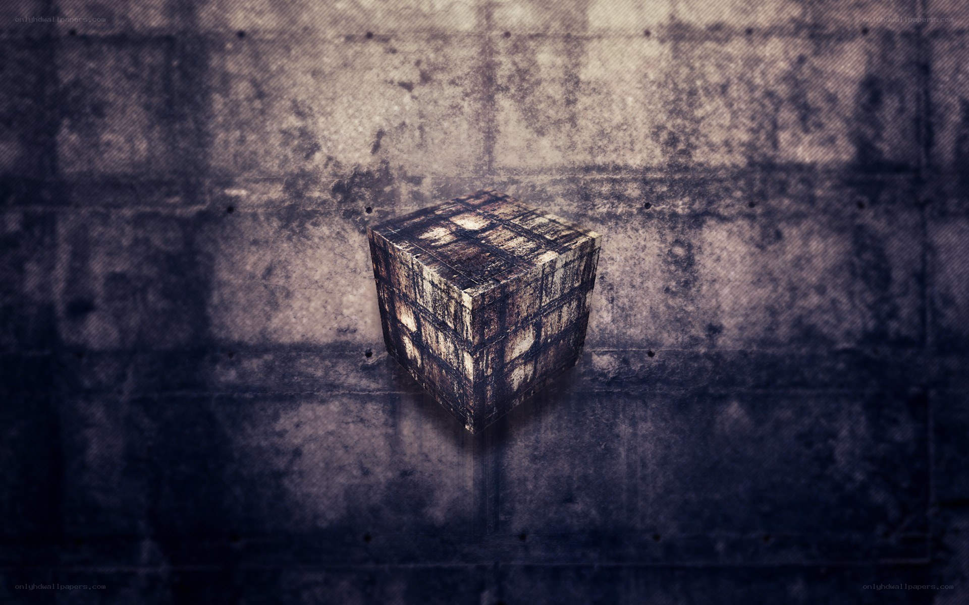 rustic cube on concrete wall