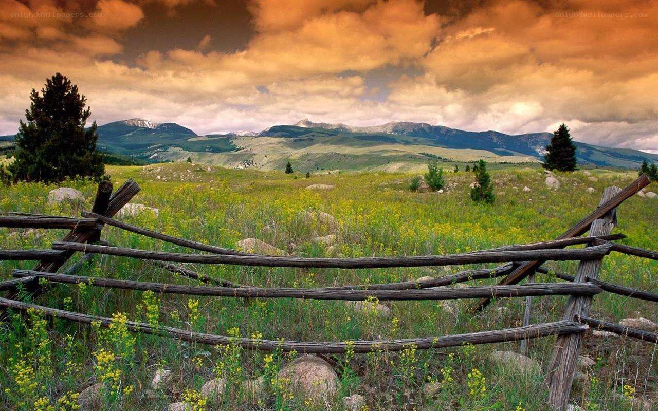 Rustic fence in a mountain valley