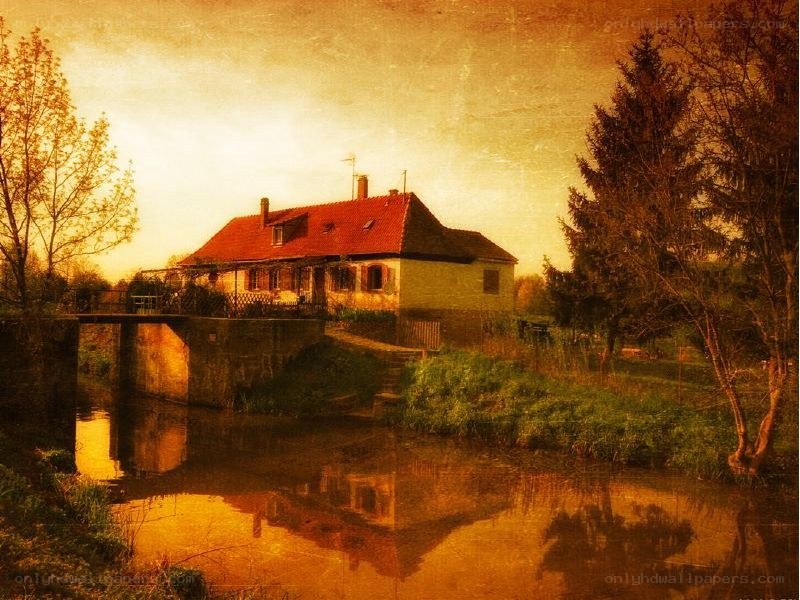 Rustic house by a river