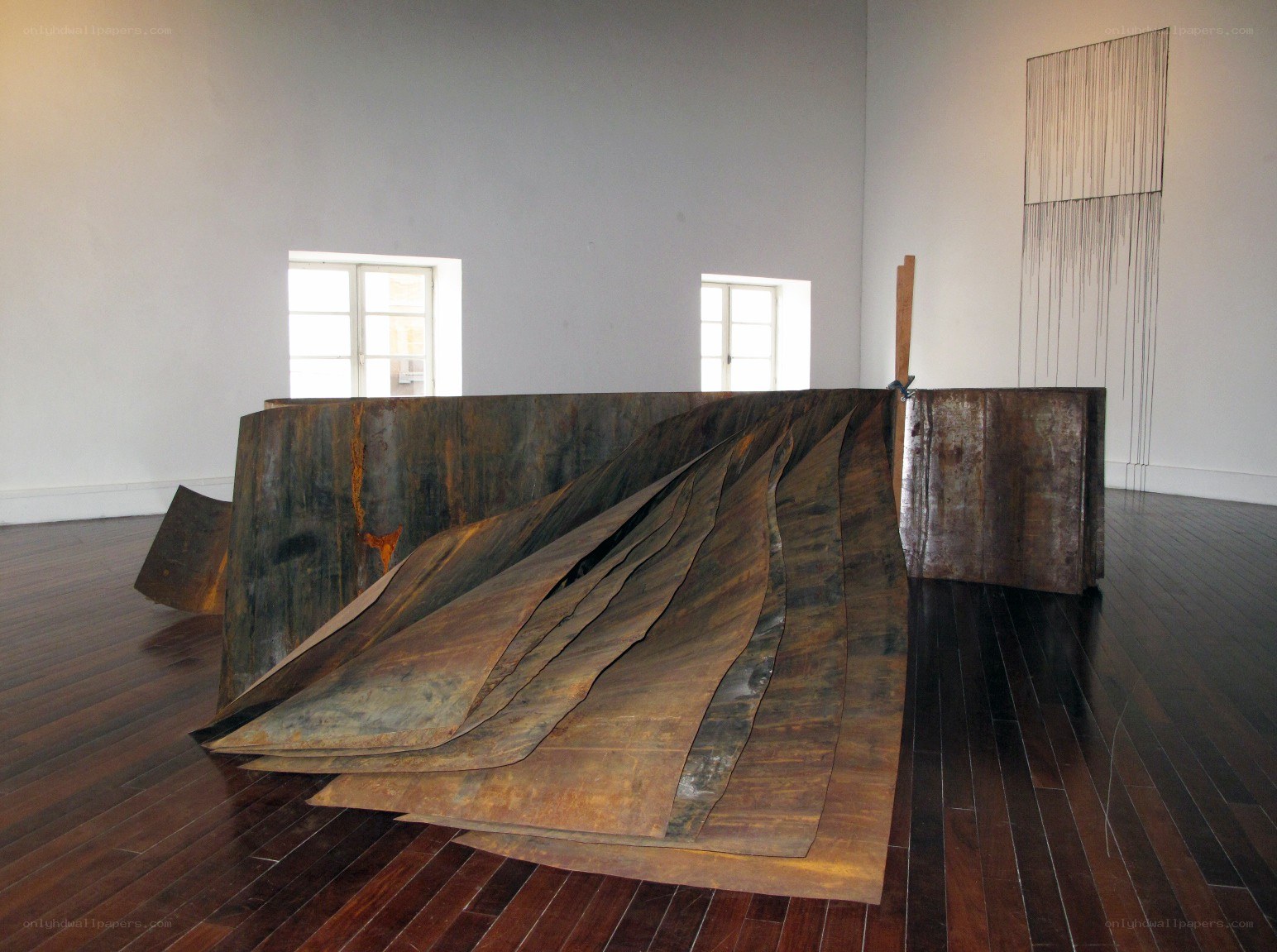Rustic metal sculpture in gallery