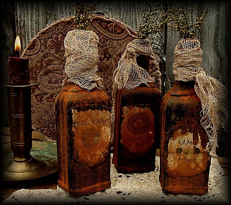 rustic potion bottles with candle