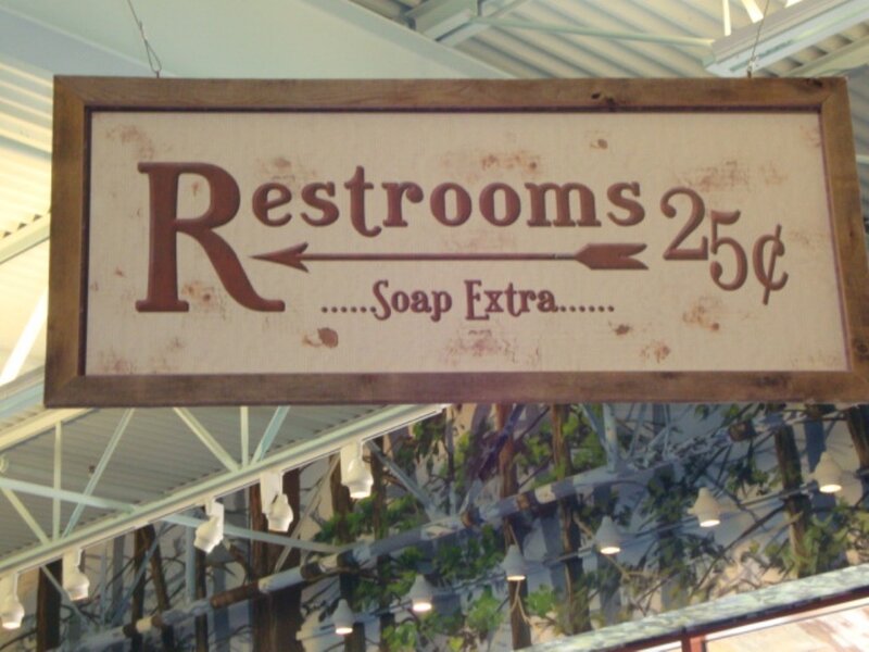 Rustic restroom sign with price
