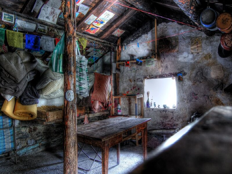 Rustic room with prayer flags