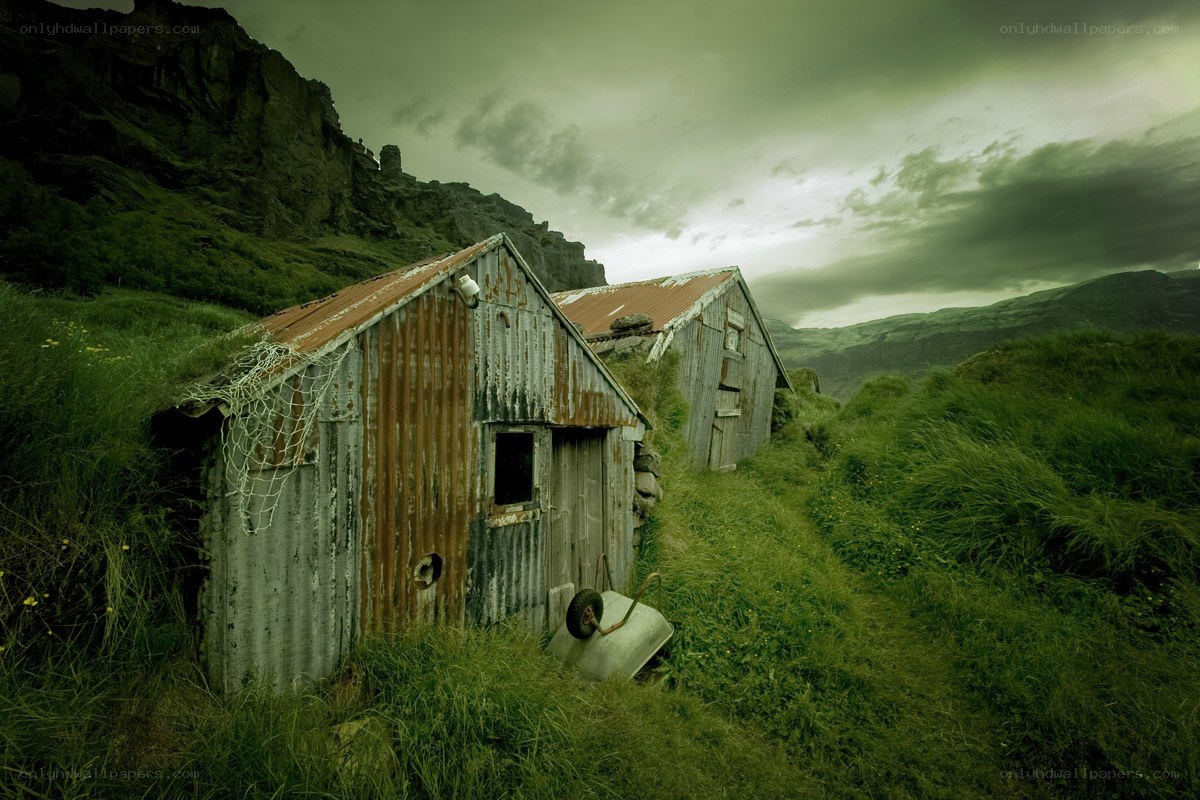 Rustic sheds in a green valley