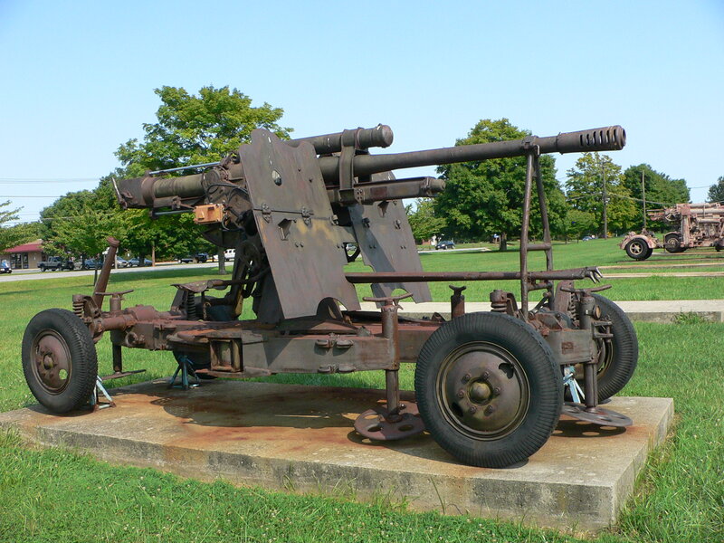 Rusty artillery piece on display