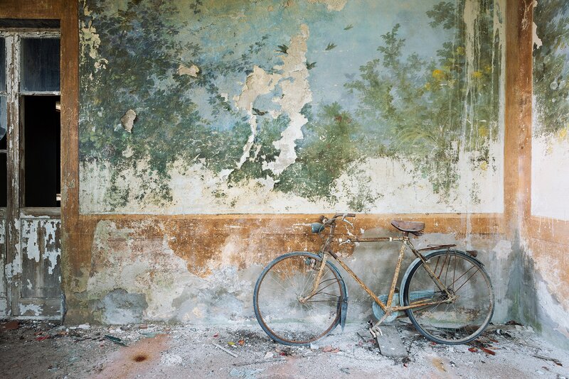 Rusty Bicycle Against Wall — Brown, Decayed