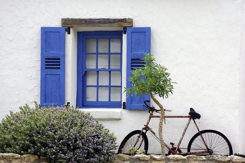 Rusty Bicycle by Window